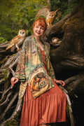 Woman wearing Woodland Wisdom Matinée Duster by Market of Stars, with barn owls. Duster showcases foxes, birds, and forest art.