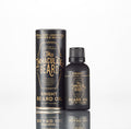 The Immaculate Beard Dark Bright Beard Oil, herbal mint, lemon peel, lavender & sea salt scent, 1 oz bottle with packaging.