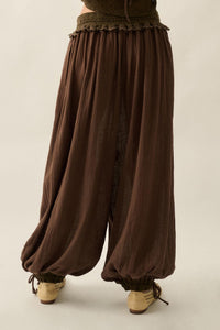 Promesa Break Free Balloon Pants in natural brown, featuring a loose, billowy fit and elasticized ankles.
