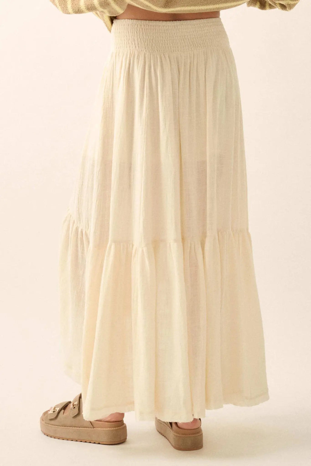 Promesa Pretty Precious Ruffle Maxi Skirt in Off White, featuring a smocked waist and tiered ruffle design.