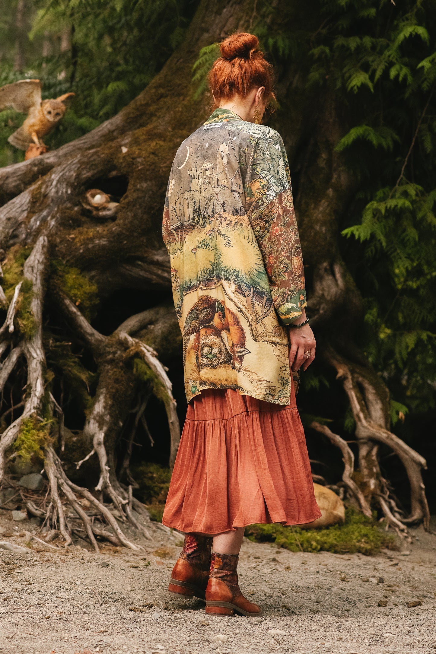 Woodland Wisdom Matinée Duster | Market of Stars, intricate forest print with owl and fox, worn with rust skirt & brown boots.