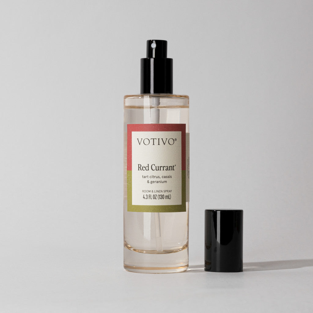 Votivo Red Currant Room & Linen Spray bottle with black sprayer and cap, 4.3 FL OZ, tart citrus, cassis & geranium.