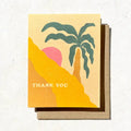 Daydream Prints Thank You Palm Tree Palm Springs Card featuring a desert landscape with a pink sun and teal palm tree.